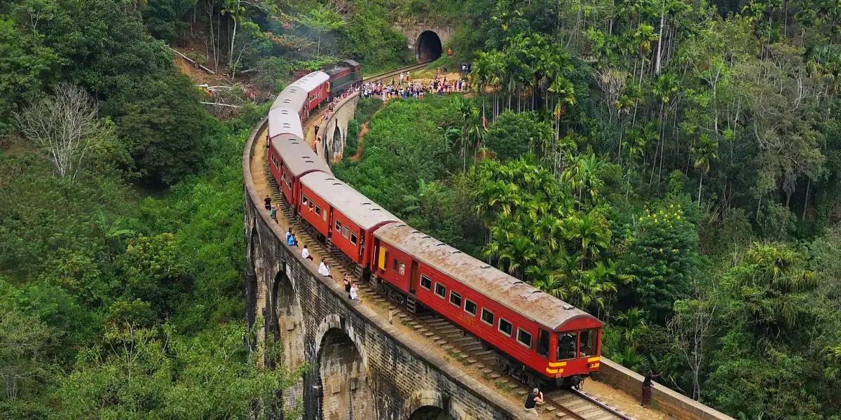 Nine Arch Bridge Ella Sri Lanka surrounded by tea plantations in clear morning weather