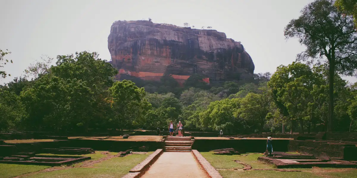 Sigiriya Lion Rock fortress rising above dry zone forest in Sri Lanka Cultural Triangle